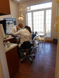 dentist in st joseph mo attending to a patient at foundations of health dental care in st joseph mo
